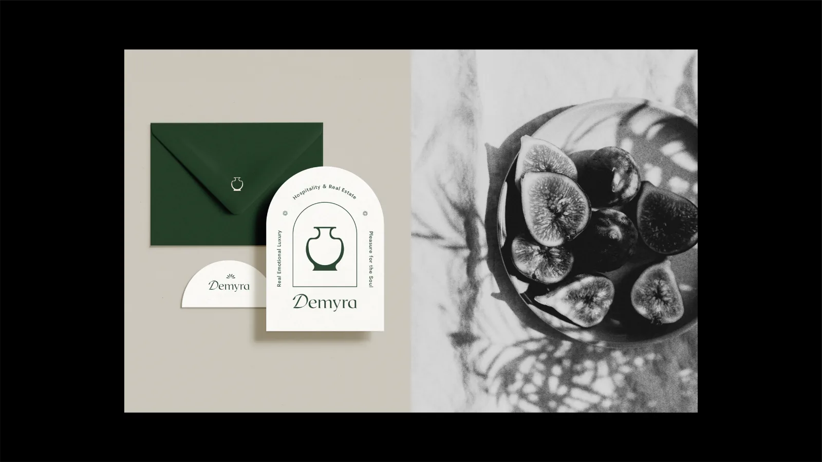 Green envelope and arched Demyra cards beside a black-and-white bowl of figs