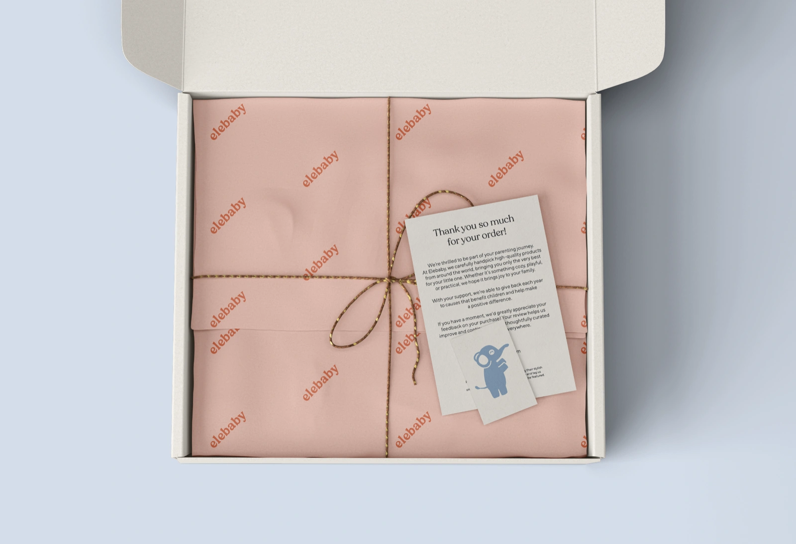 Woven label and cotton hang tag with brand mark