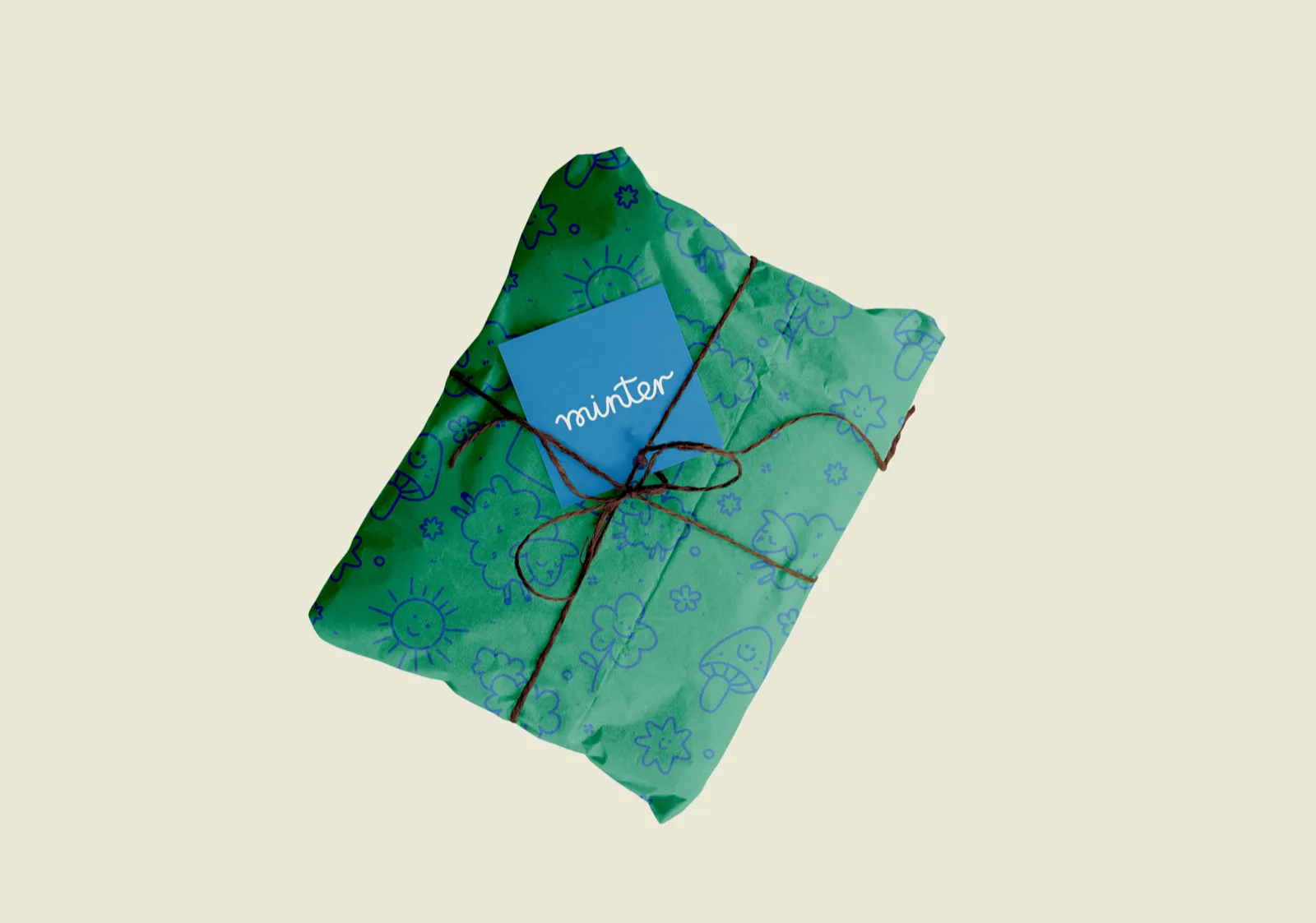Green illustrated gift wrap with minter hang tag