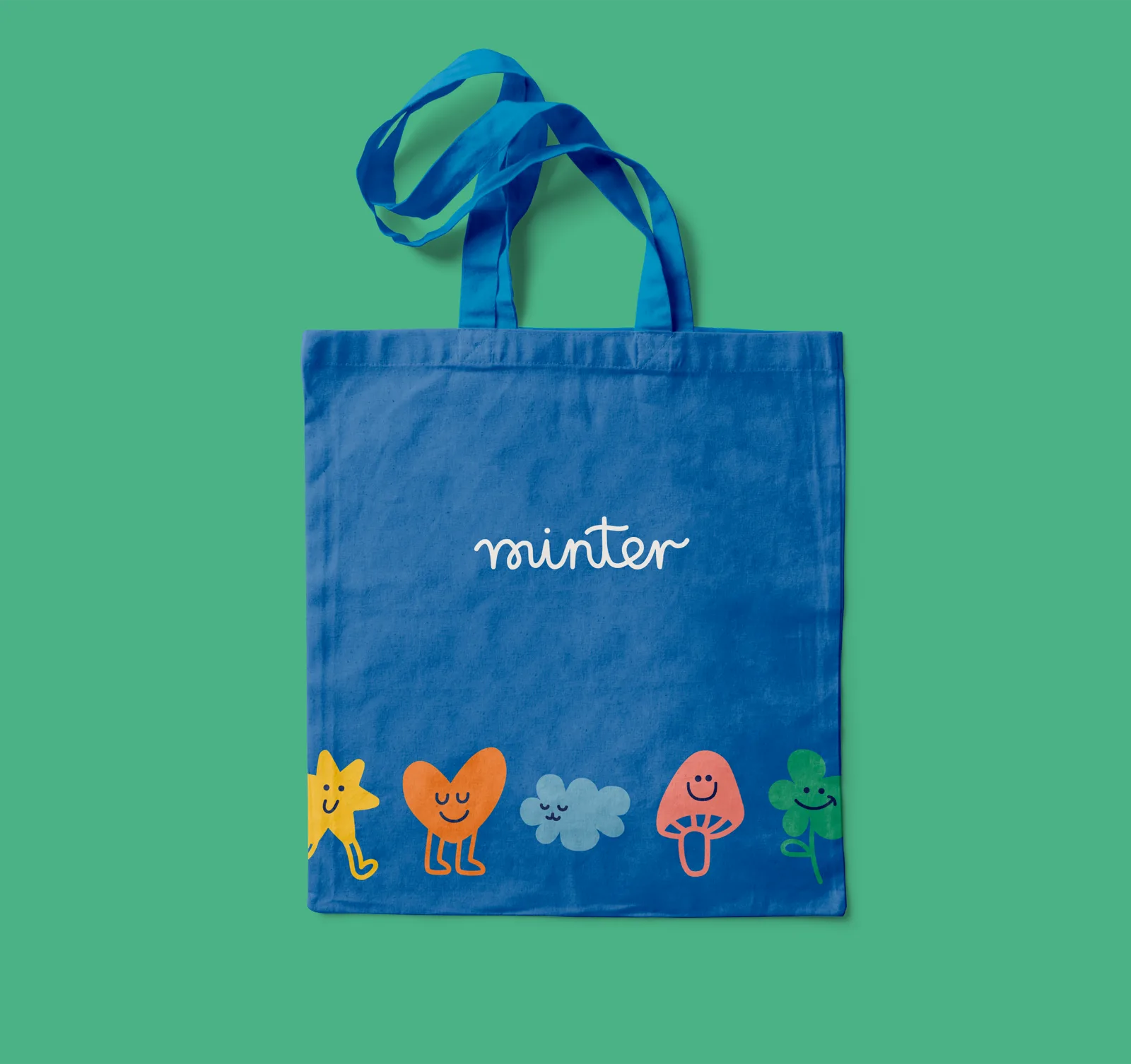 Blue tote bag with minter wordmark and character lineup